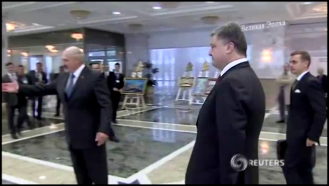 Путин и Порошенко пожали друг другу руки в Минске